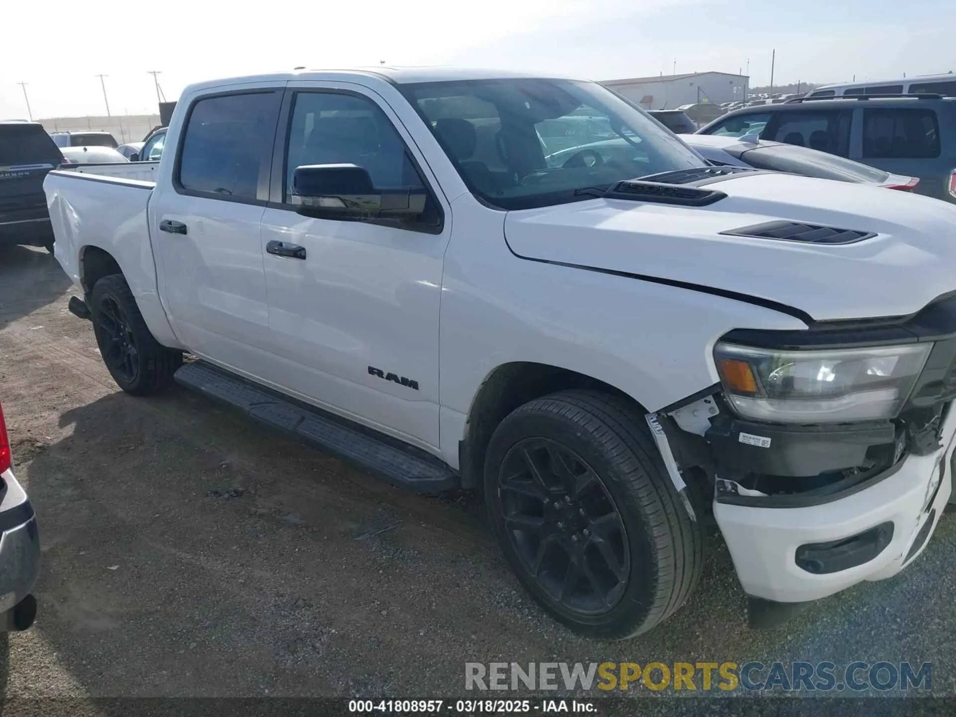 13 Photograph of a damaged car 1C6SRFJT7PN541092 RAM 1500 2023