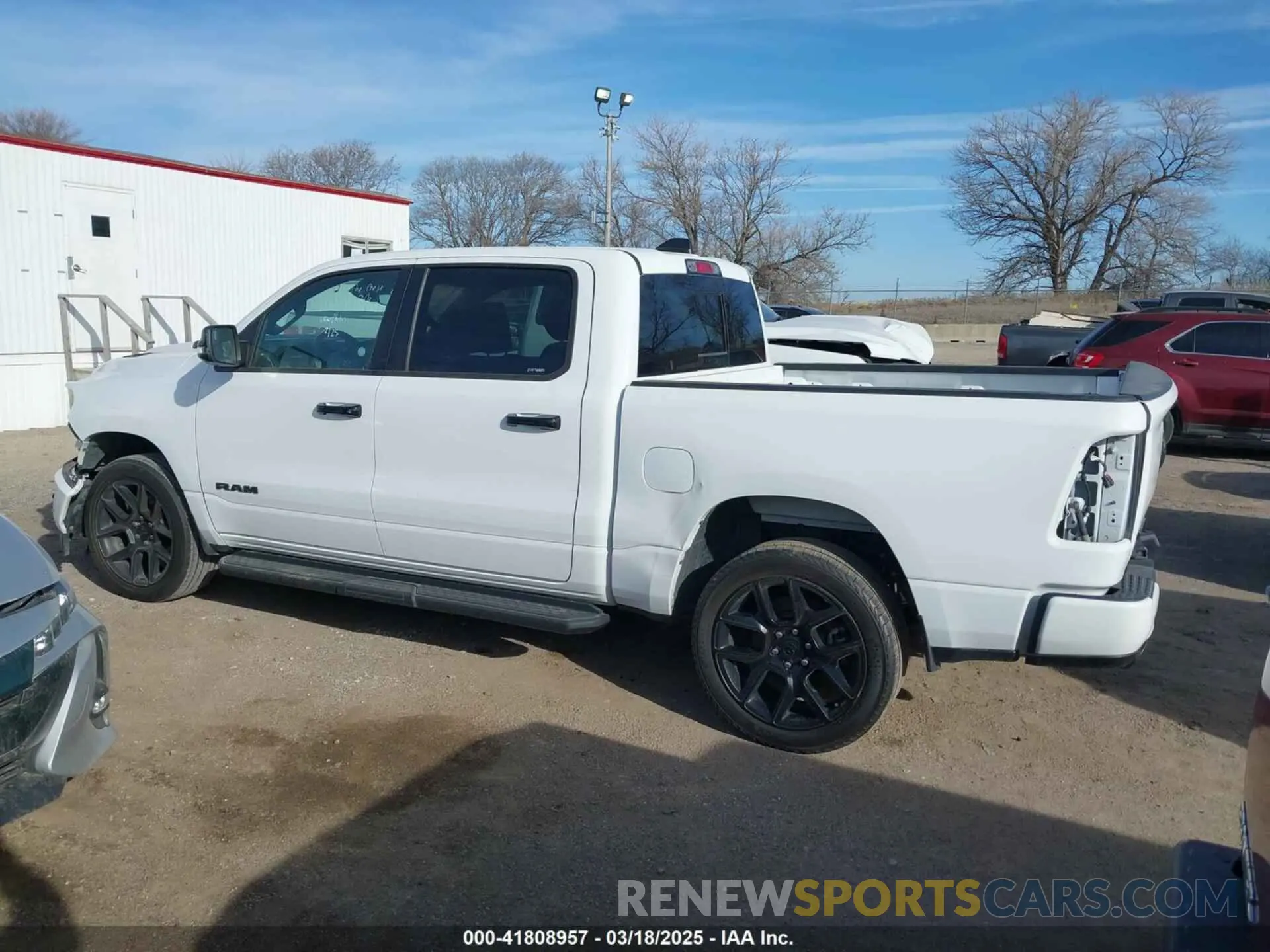 14 Photograph of a damaged car 1C6SRFJT7PN541092 RAM 1500 2023