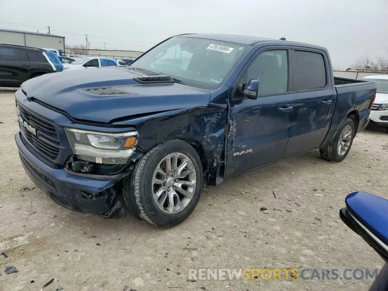 1 Photograph of a damaged car 1C6SRFJT7PN583150 RAM 1500 2023