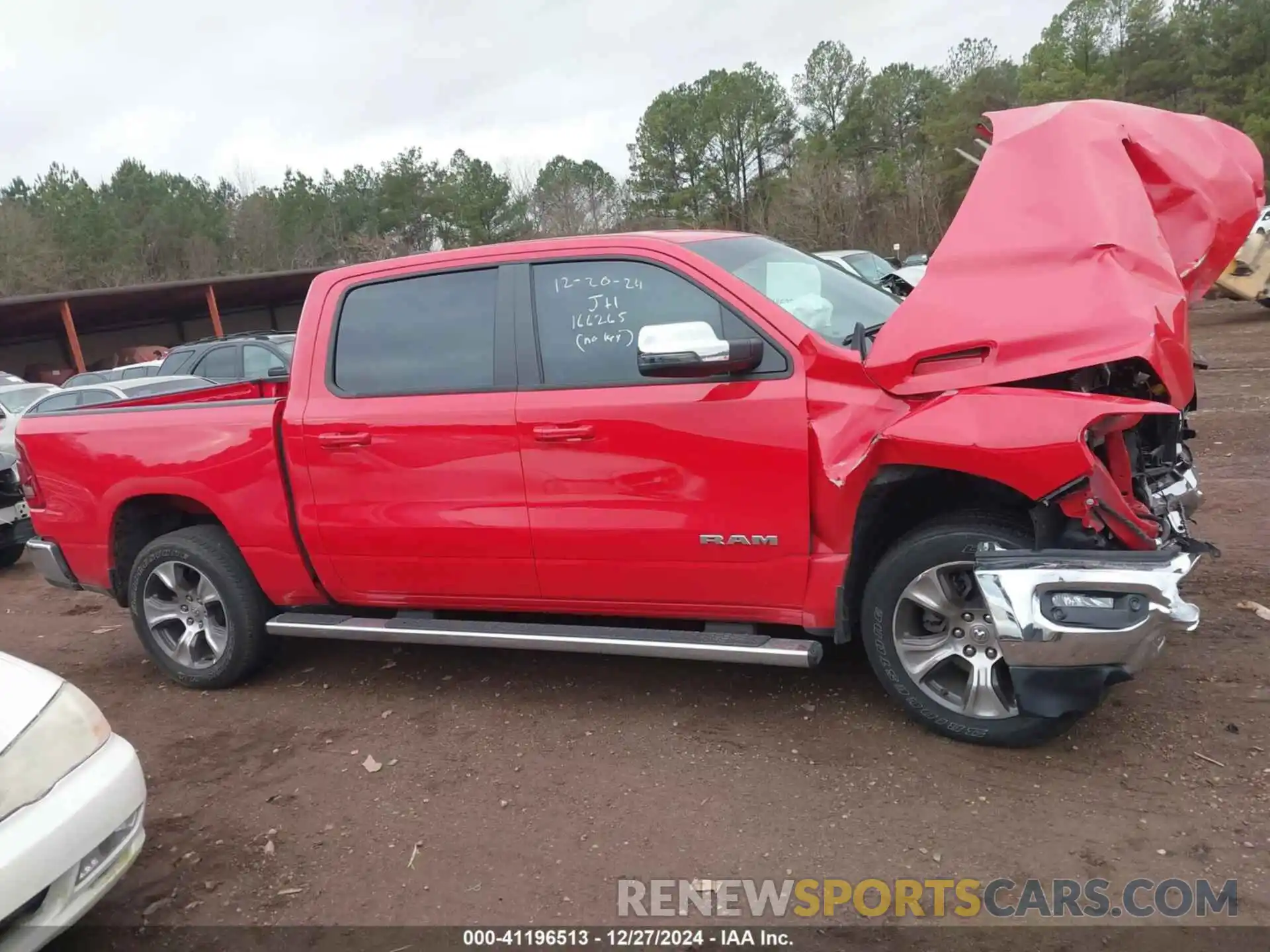 12 Photograph of a damaged car 1C6SRFJT7PN587831 RAM 1500 2023