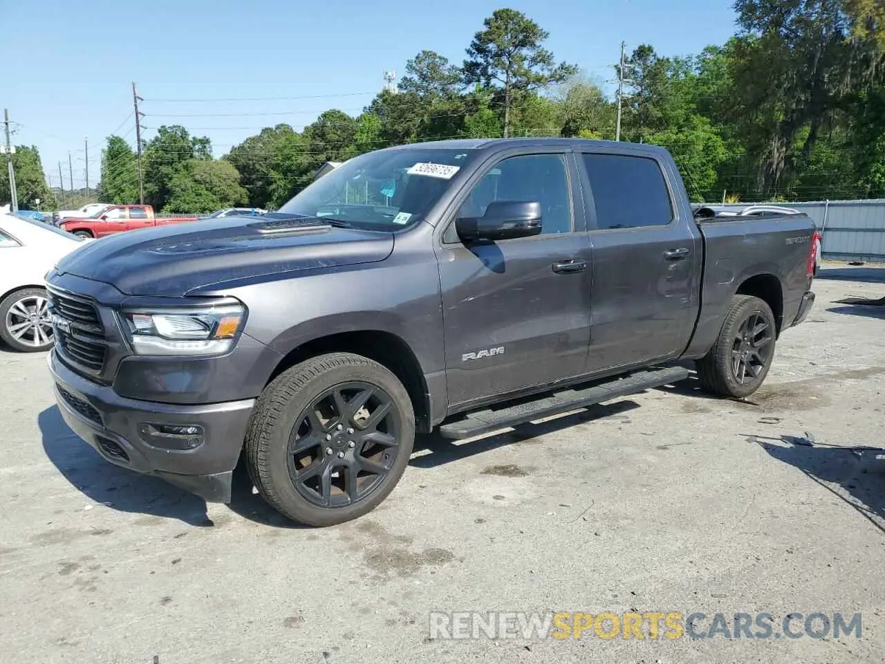 1 Photograph of a damaged car 1C6SRFJT7PN602148 RAM 1500 2023