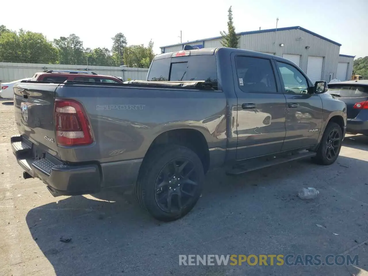 3 Photograph of a damaged car 1C6SRFJT7PN602148 RAM 1500 2023