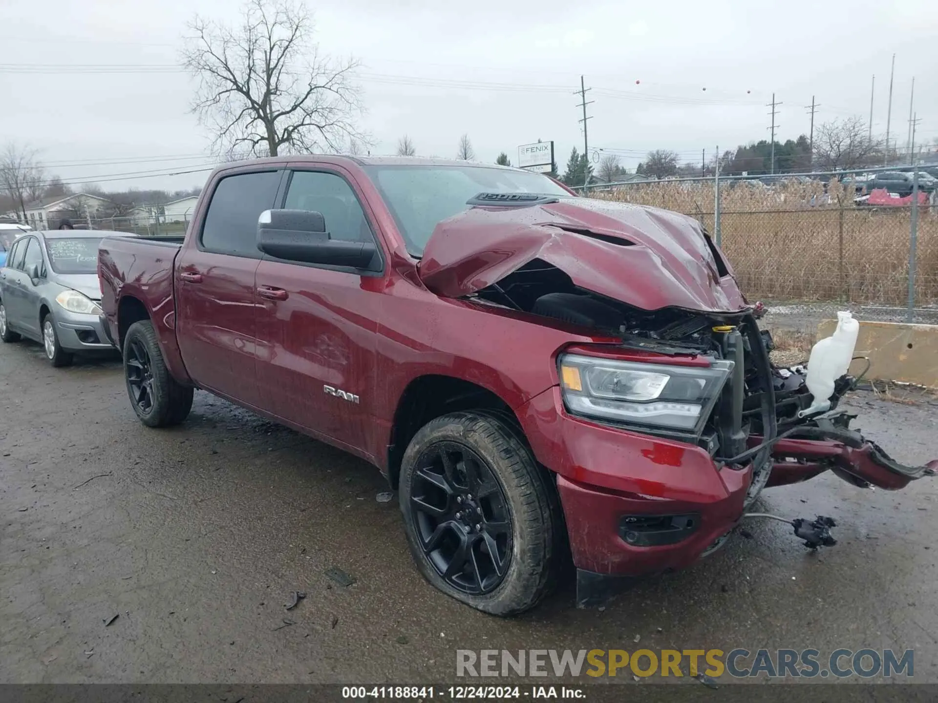 1 Photograph of a damaged car 1C6SRFJT7PN651897 RAM 1500 2023