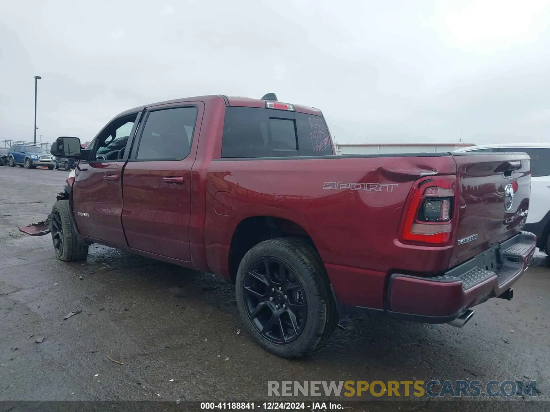 3 Photograph of a damaged car 1C6SRFJT7PN651897 RAM 1500 2023