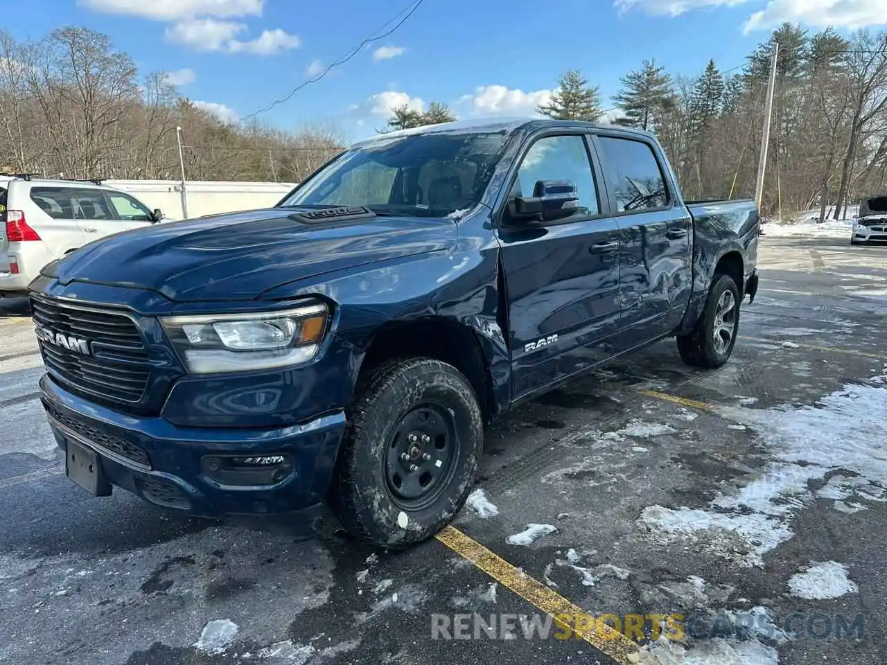 1 Photograph of a damaged car 1C6SRFJT9PN540932 RAM 1500 2023