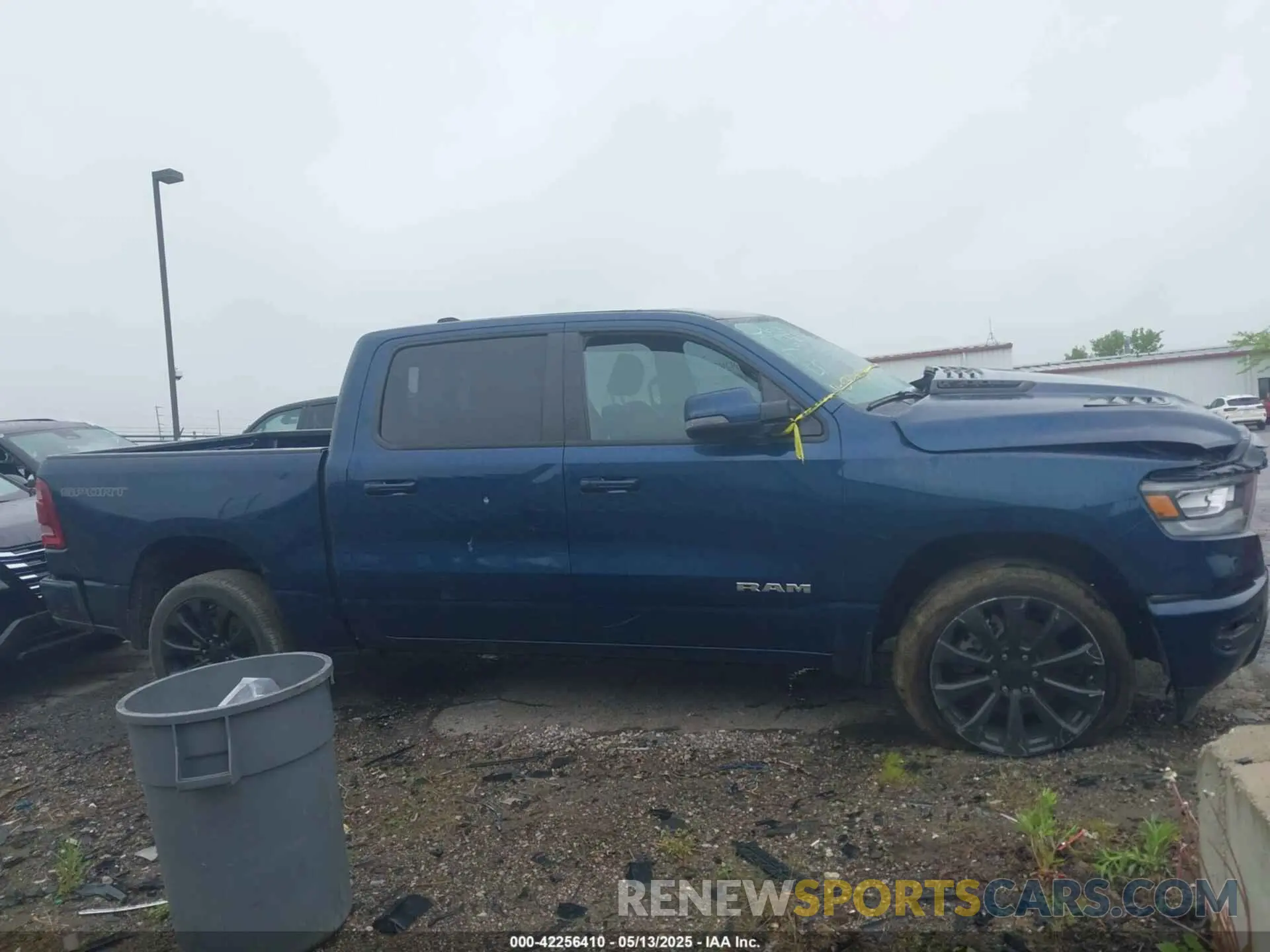 13 Photograph of a damaged car 1C6SRFJT9PN542437 RAM 1500 2023