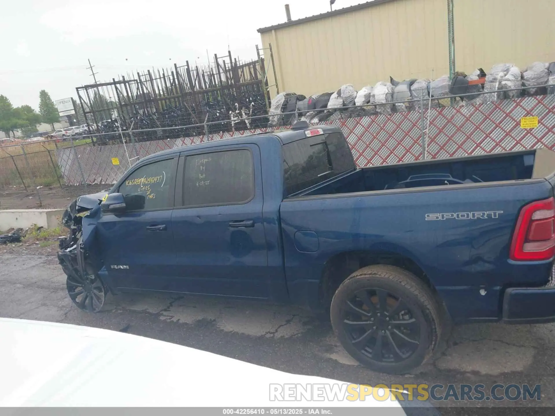 14 Photograph of a damaged car 1C6SRFJT9PN542437 RAM 1500 2023