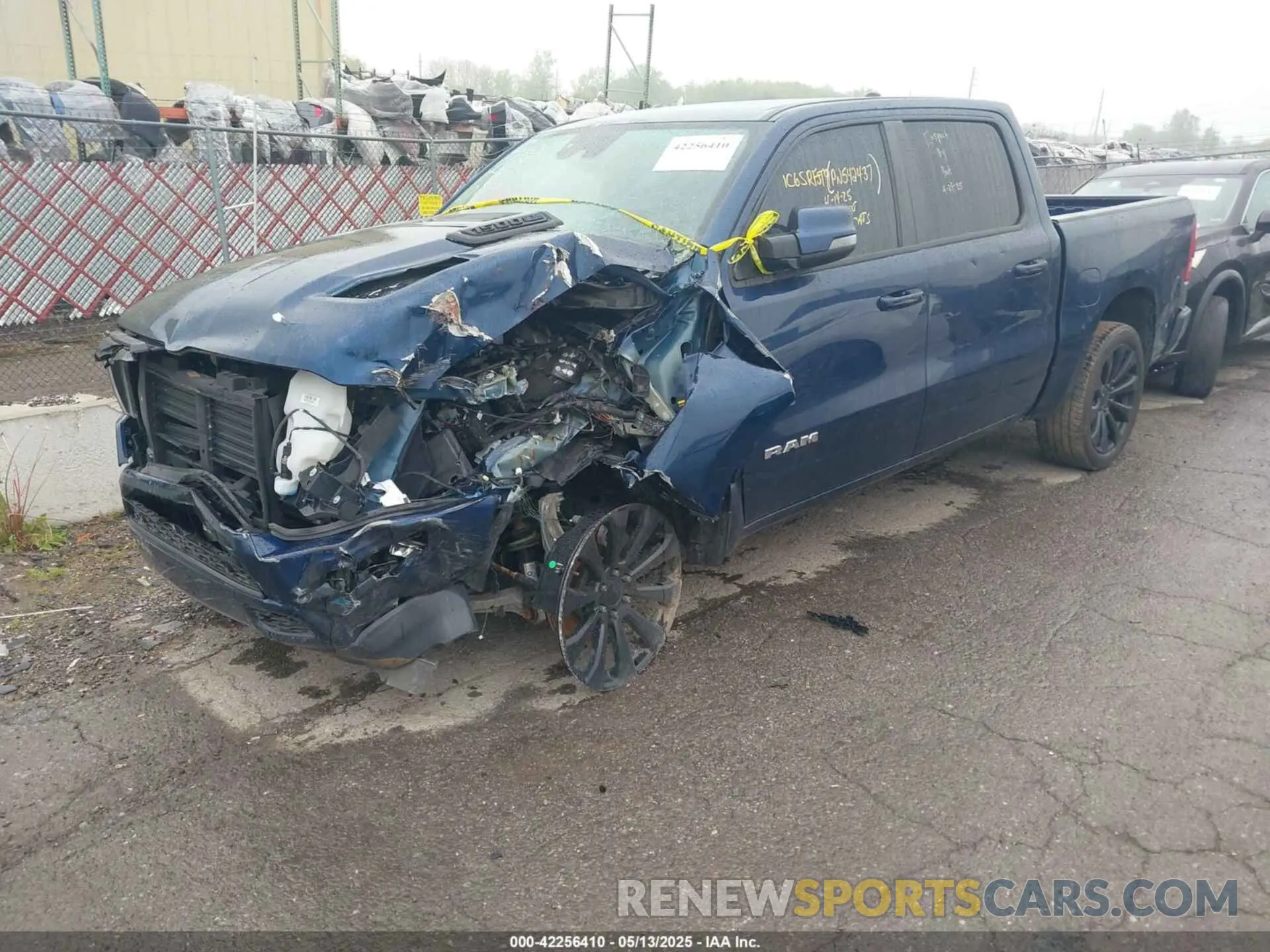 2 Photograph of a damaged car 1C6SRFJT9PN542437 RAM 1500 2023