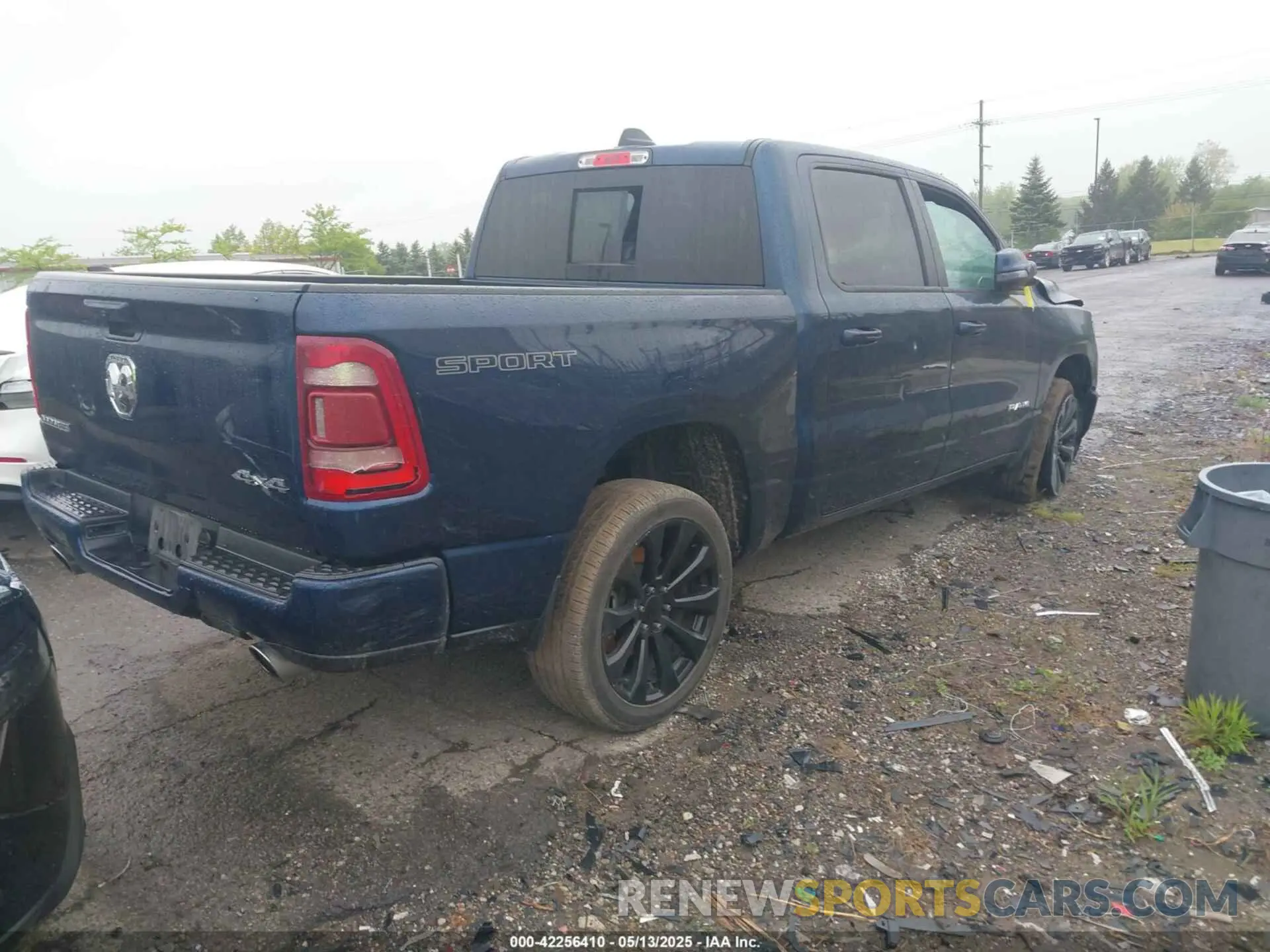 4 Photograph of a damaged car 1C6SRFJT9PN542437 RAM 1500 2023