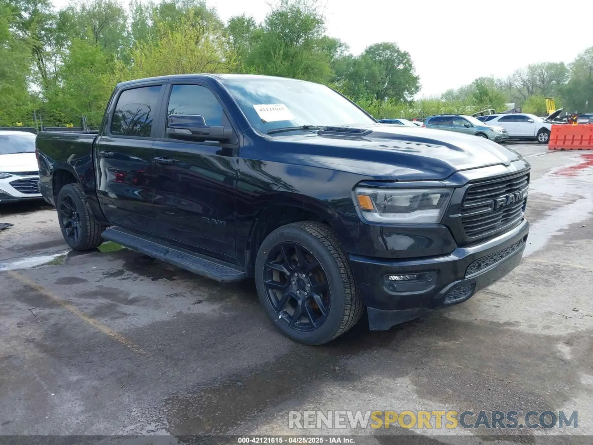 1 Photograph of a damaged car 1C6SRFJTXPN541328 RAM 1500 2023