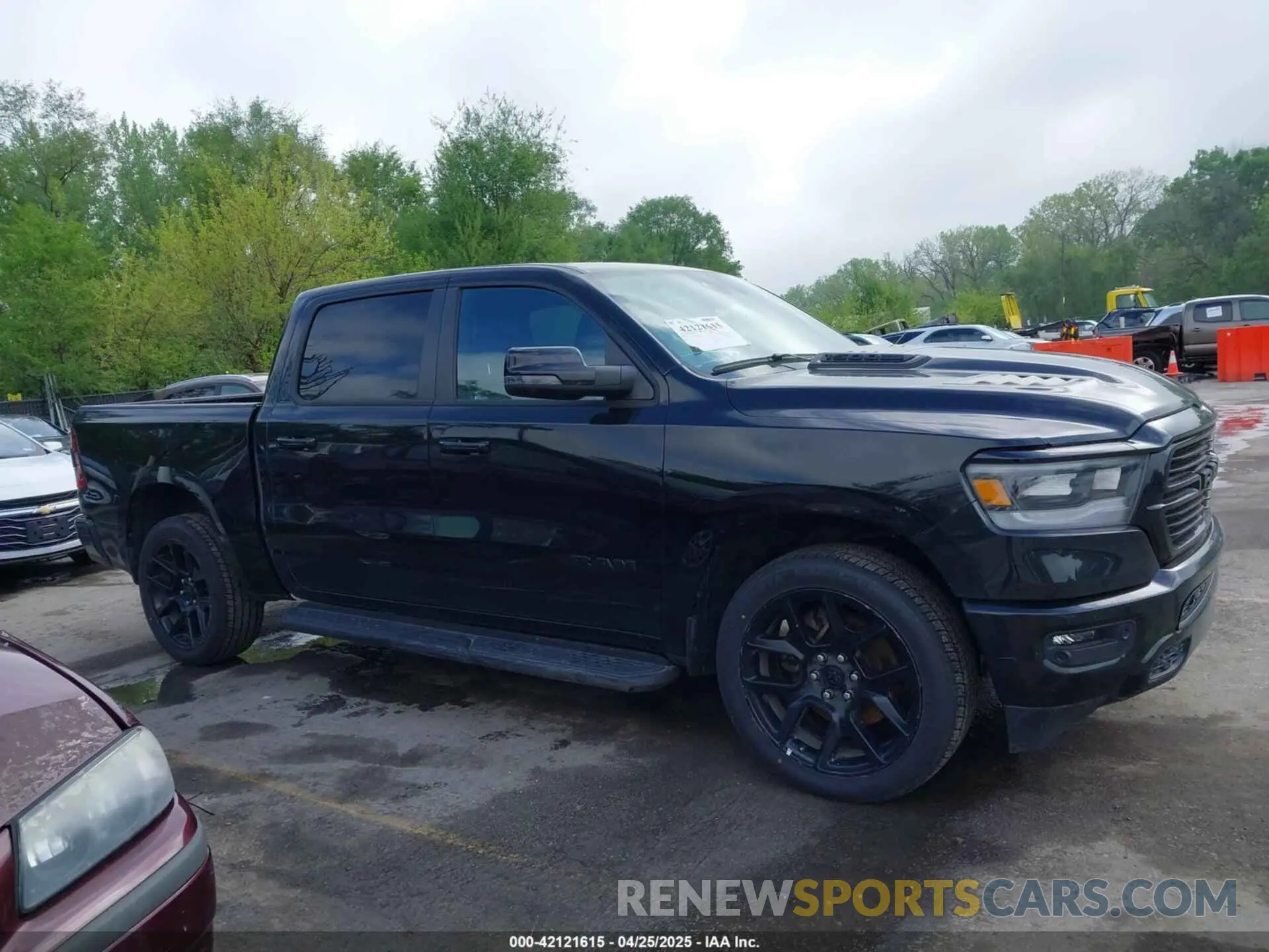 13 Photograph of a damaged car 1C6SRFJTXPN541328 RAM 1500 2023