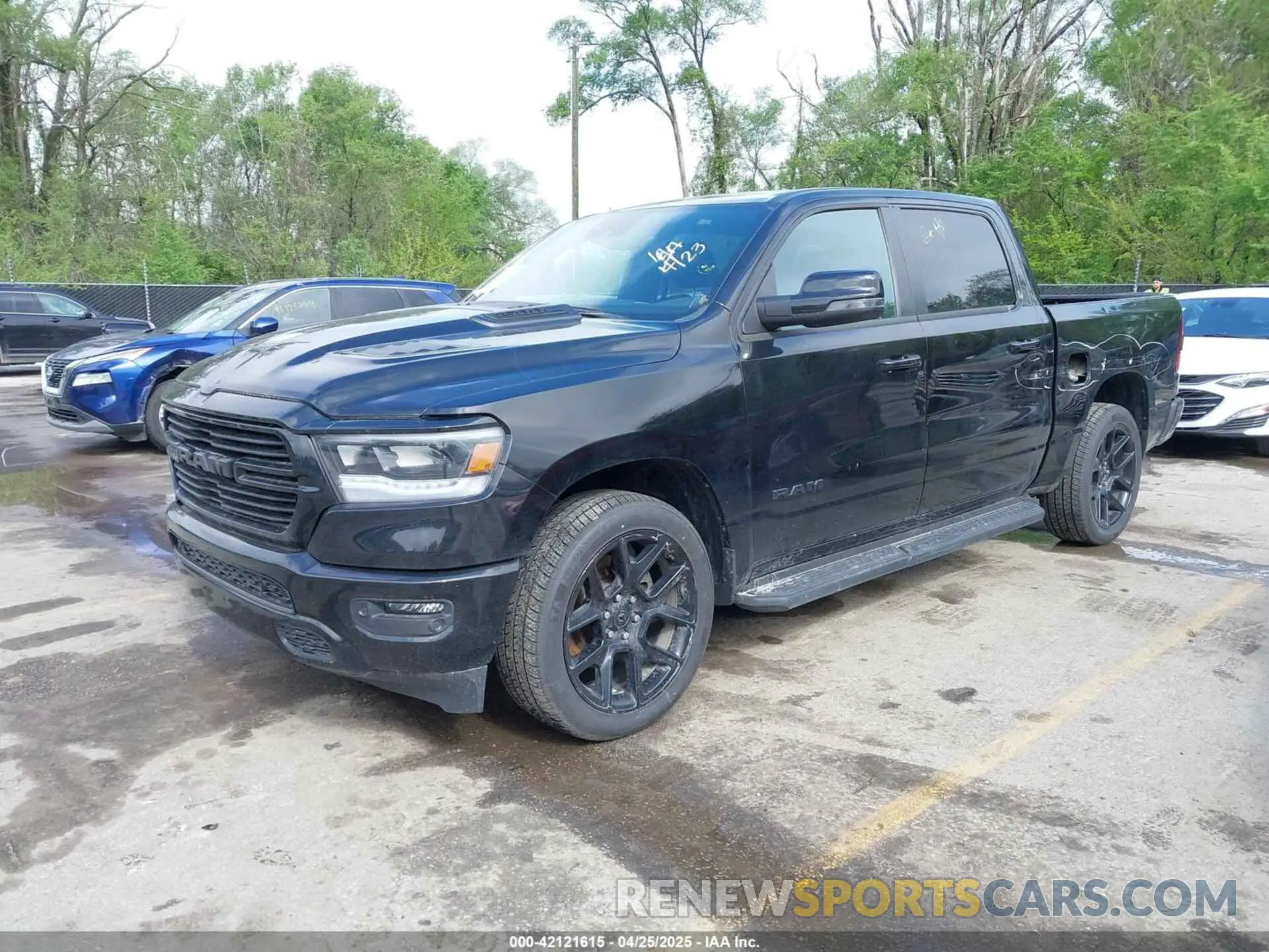 2 Photograph of a damaged car 1C6SRFJTXPN541328 RAM 1500 2023