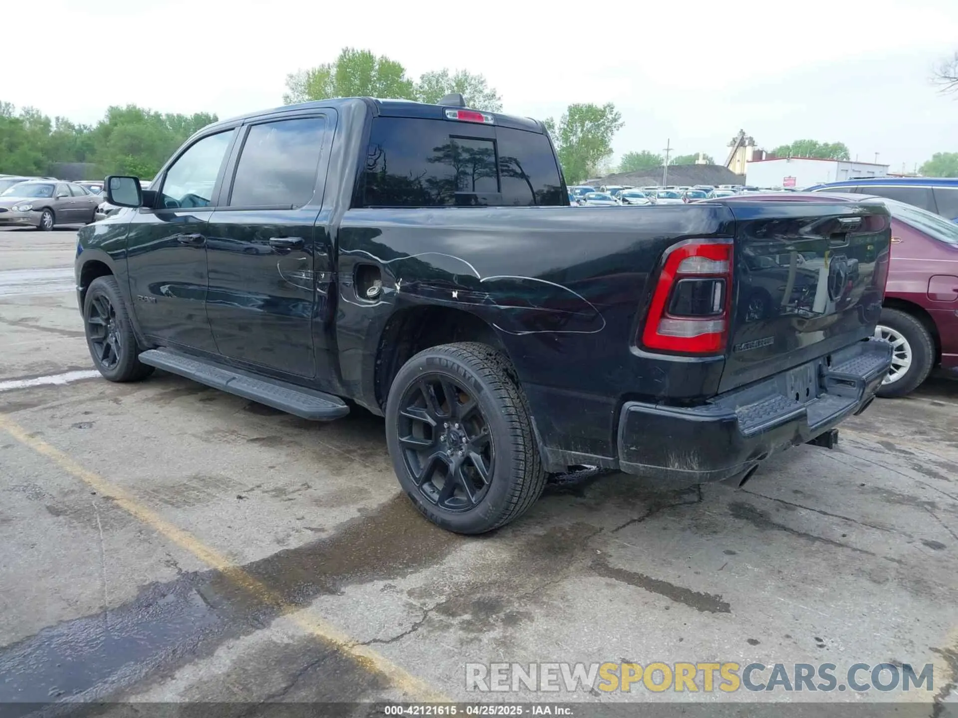 3 Photograph of a damaged car 1C6SRFJTXPN541328 RAM 1500 2023