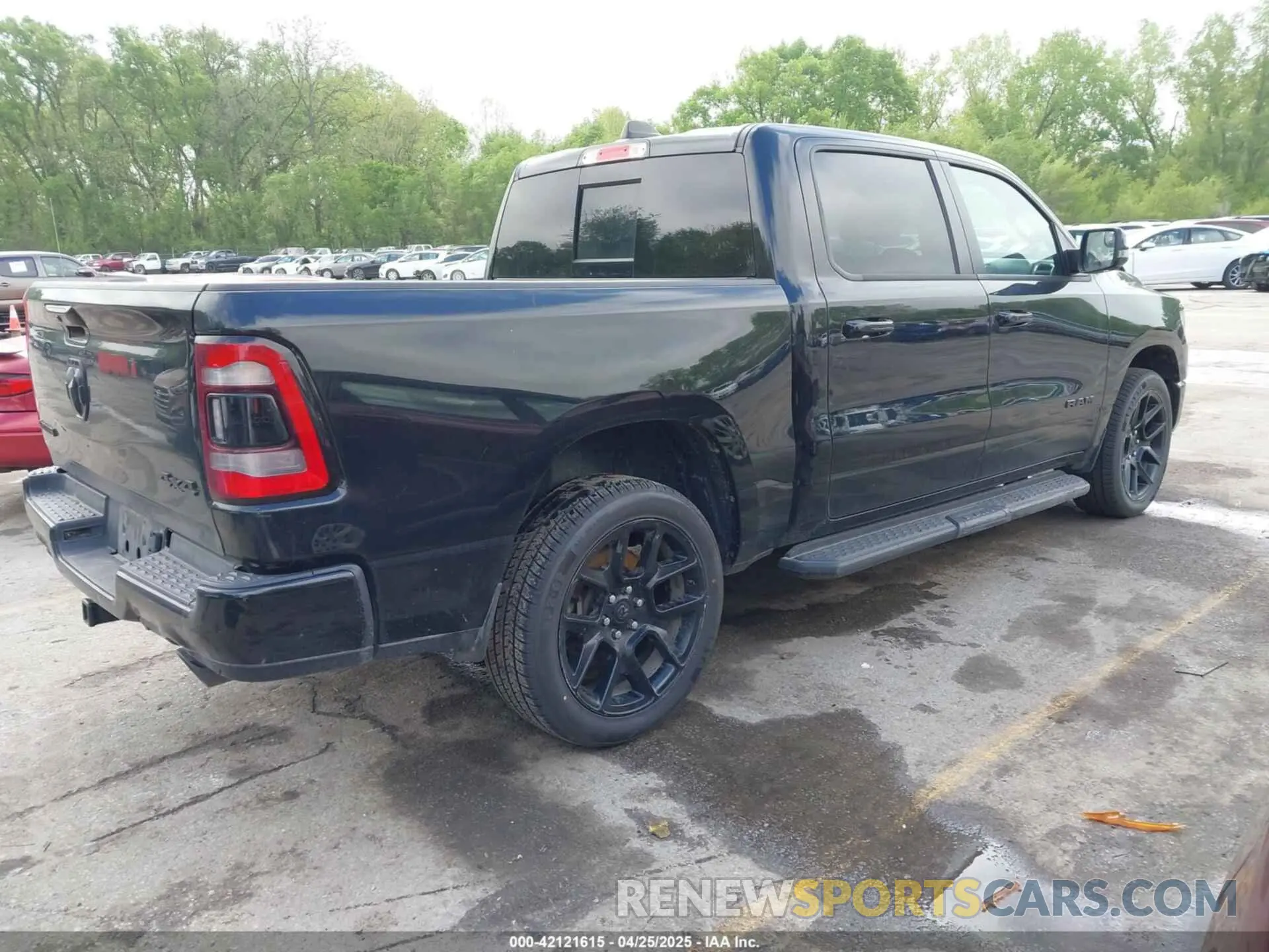4 Photograph of a damaged car 1C6SRFJTXPN541328 RAM 1500 2023