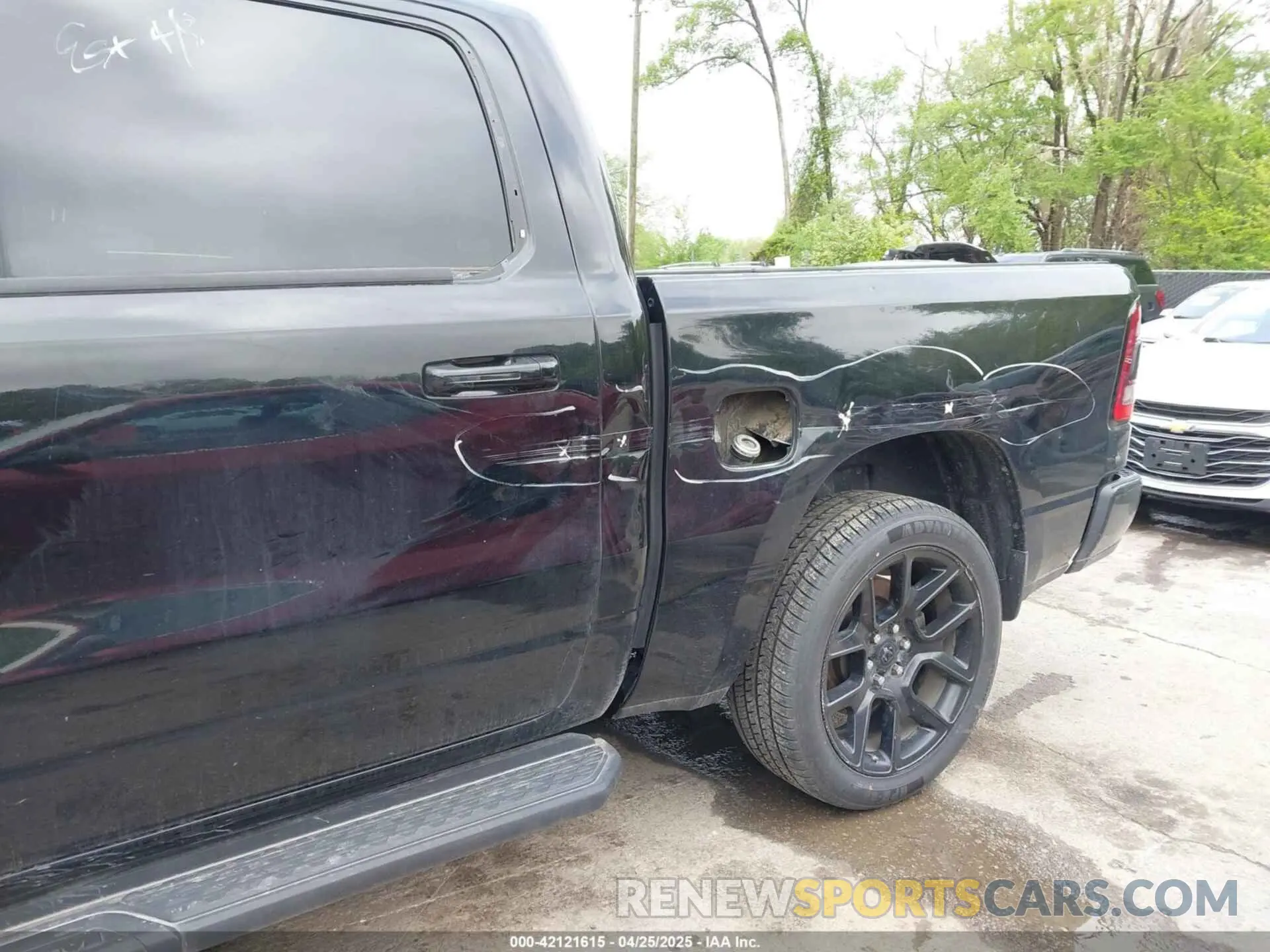 6 Photograph of a damaged car 1C6SRFJTXPN541328 RAM 1500 2023