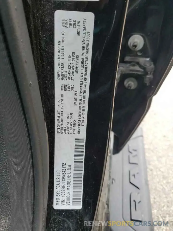 13 Photograph of a damaged car 1C6SRFJTXPN542172 RAM 1500 2023