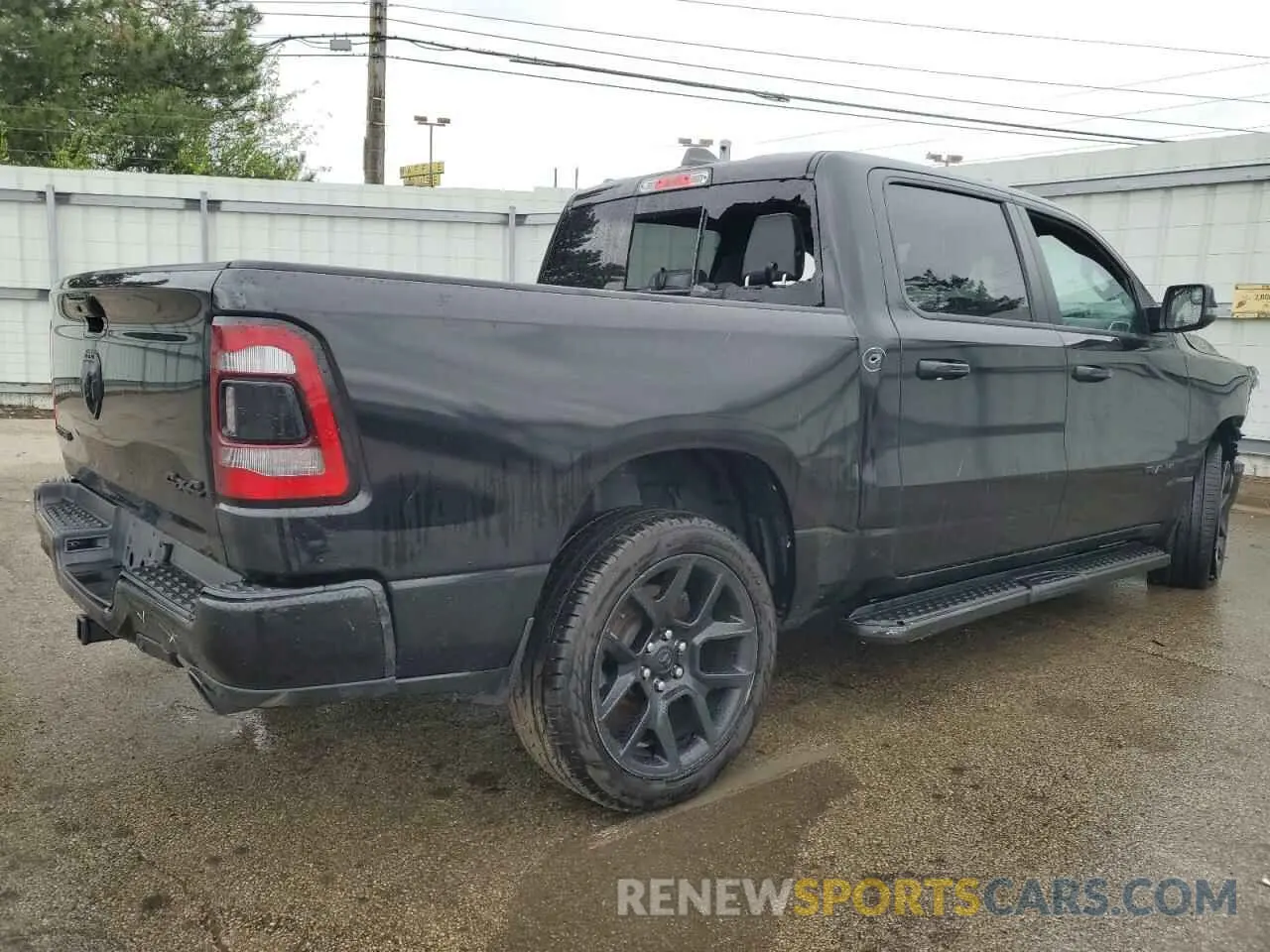 3 Photograph of a damaged car 1C6SRFJTXPN542172 RAM 1500 2023