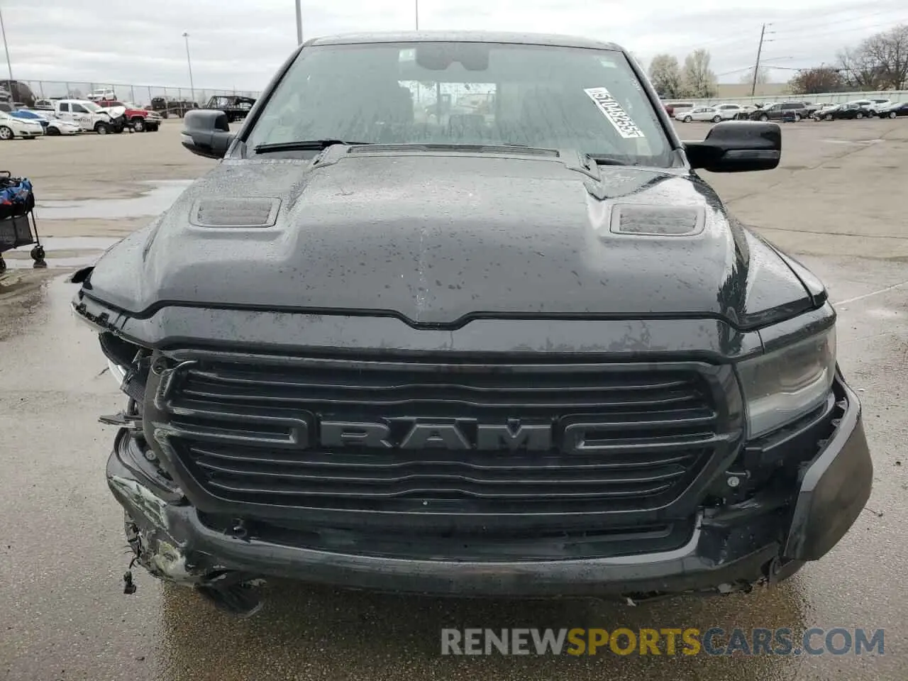 5 Photograph of a damaged car 1C6SRFJTXPN542172 RAM 1500 2023