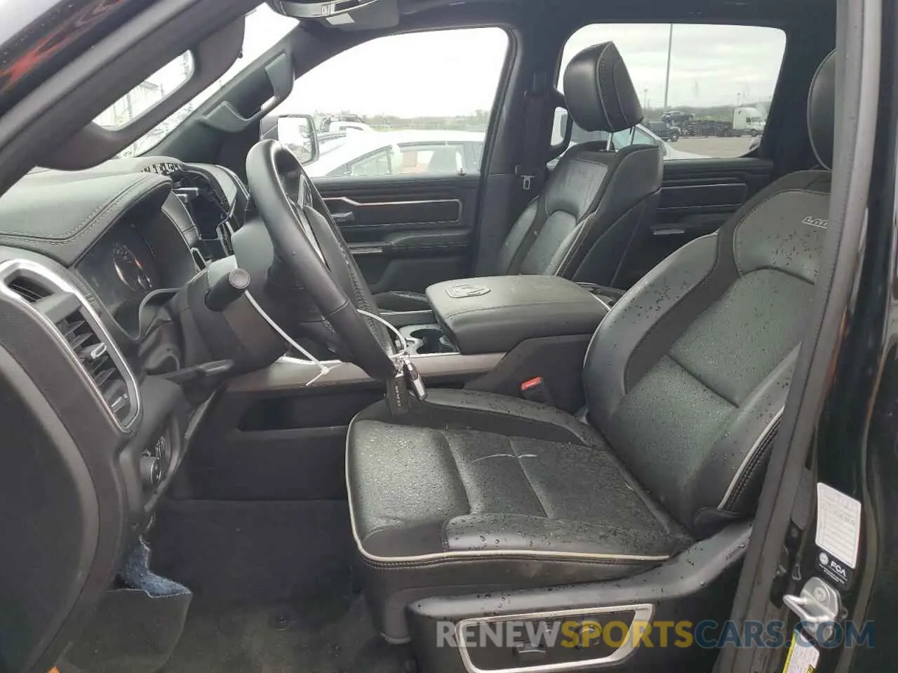 7 Photograph of a damaged car 1C6SRFJTXPN542172 RAM 1500 2023