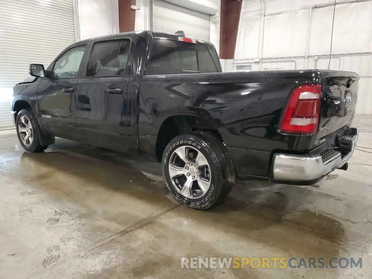 2 Photograph of a damaged car 1C6SRFJTXPN630235 RAM 1500 2023