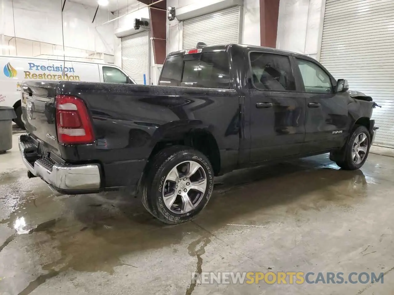 3 Photograph of a damaged car 1C6SRFJTXPN630235 RAM 1500 2023