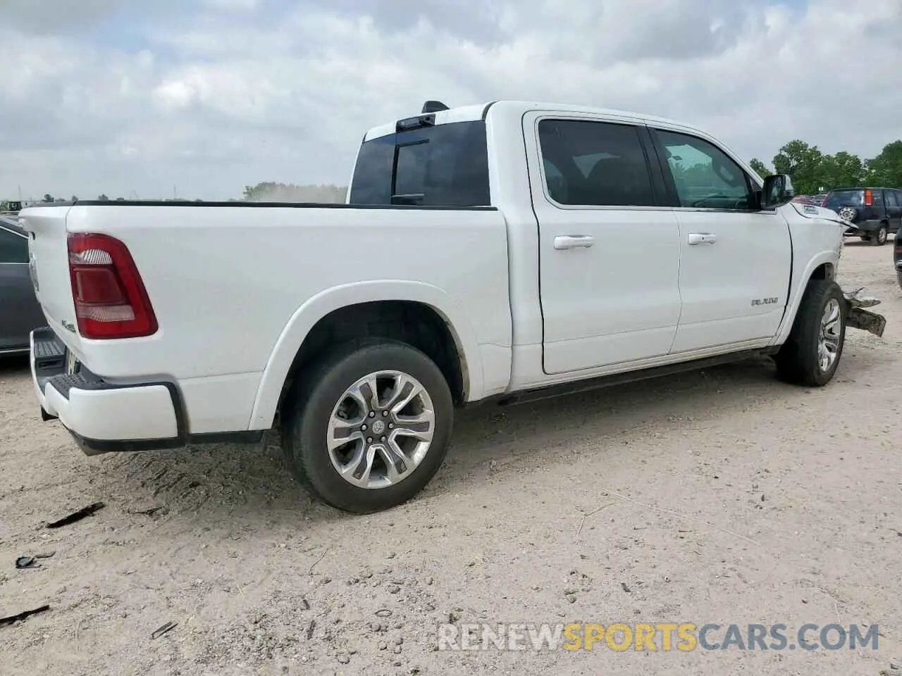 3 Photograph of a damaged car 1C6SRFKT0PN509986 RAM 1500 2023