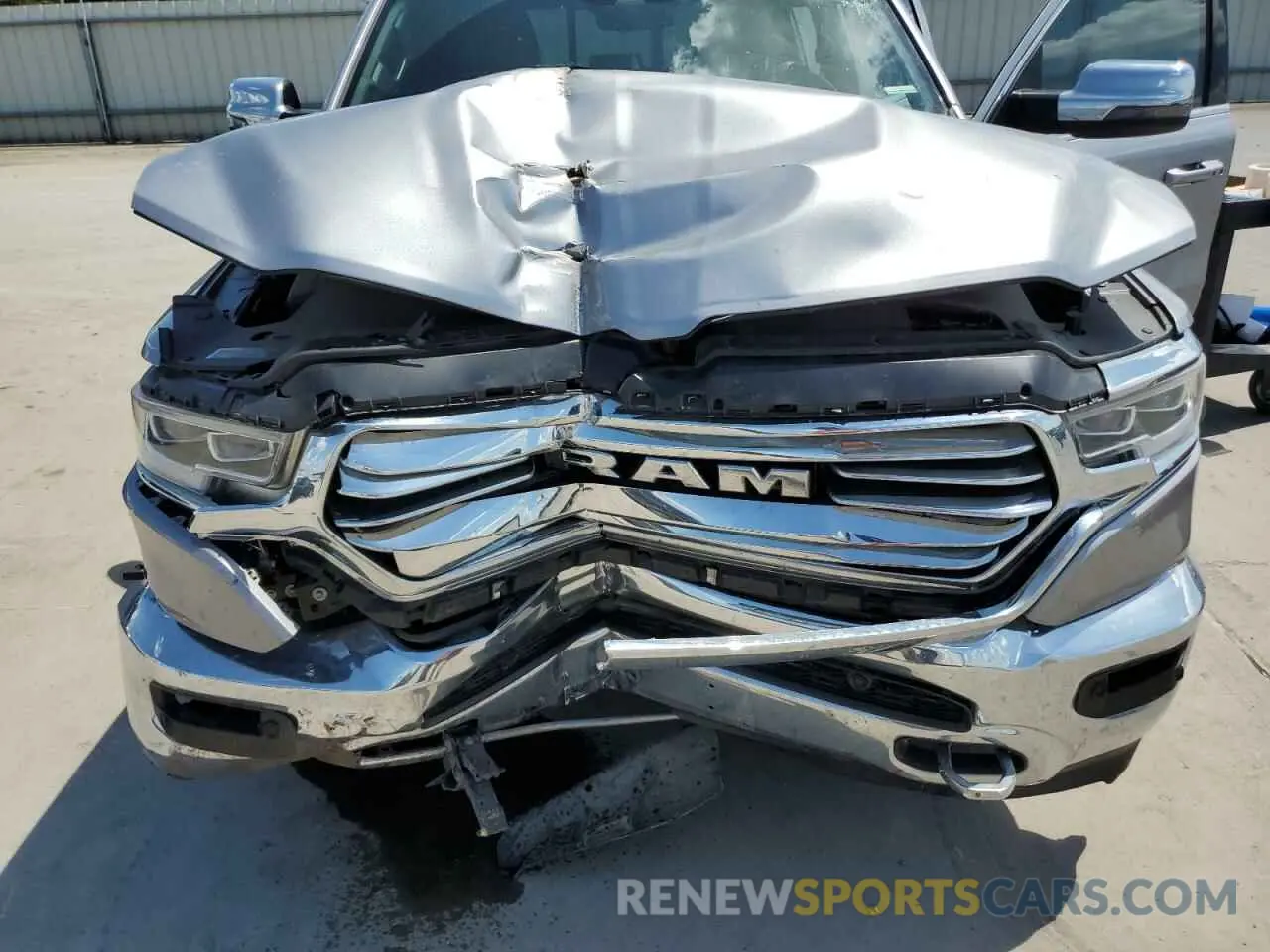 11 Photograph of a damaged car 1C6SRFKT1PN567038 RAM 1500 2023