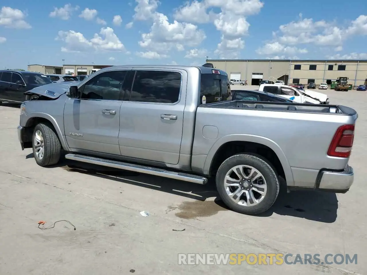 2 Photograph of a damaged car 1C6SRFKT1PN567038 RAM 1500 2023