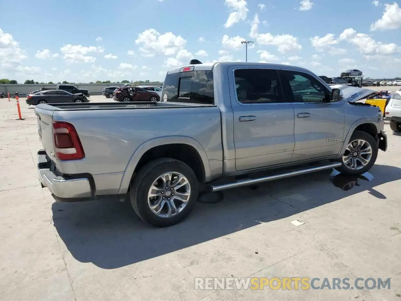 3 Photograph of a damaged car 1C6SRFKT1PN567038 RAM 1500 2023