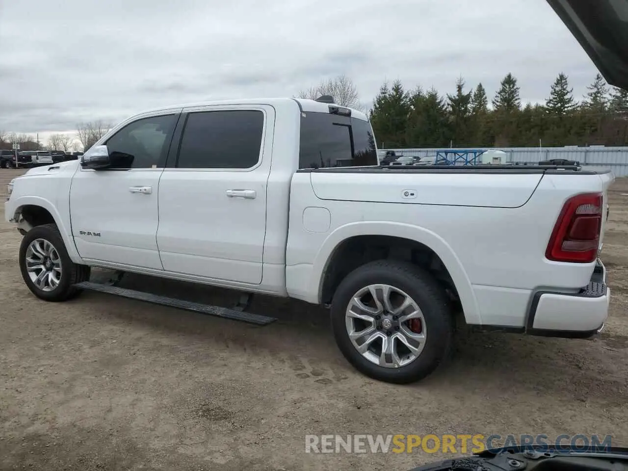 2 Photograph of a damaged car 1C6SRFKT6PN564717 RAM 1500 2023