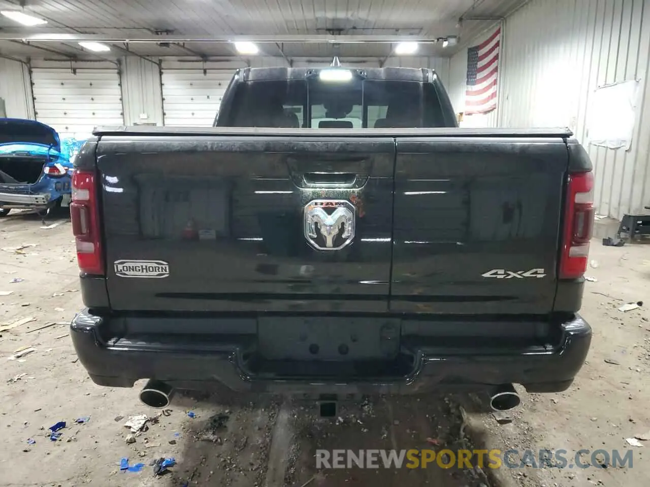 6 Photograph of a damaged car 1C6SRFKT9PN689128 RAM 1500 2023