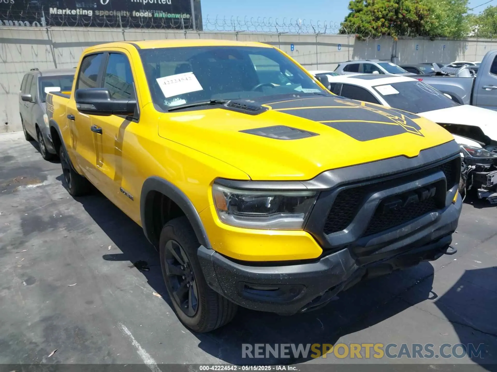 1 Photograph of a damaged car 1C6SRFLT3PN687390 RAM 1500 2023