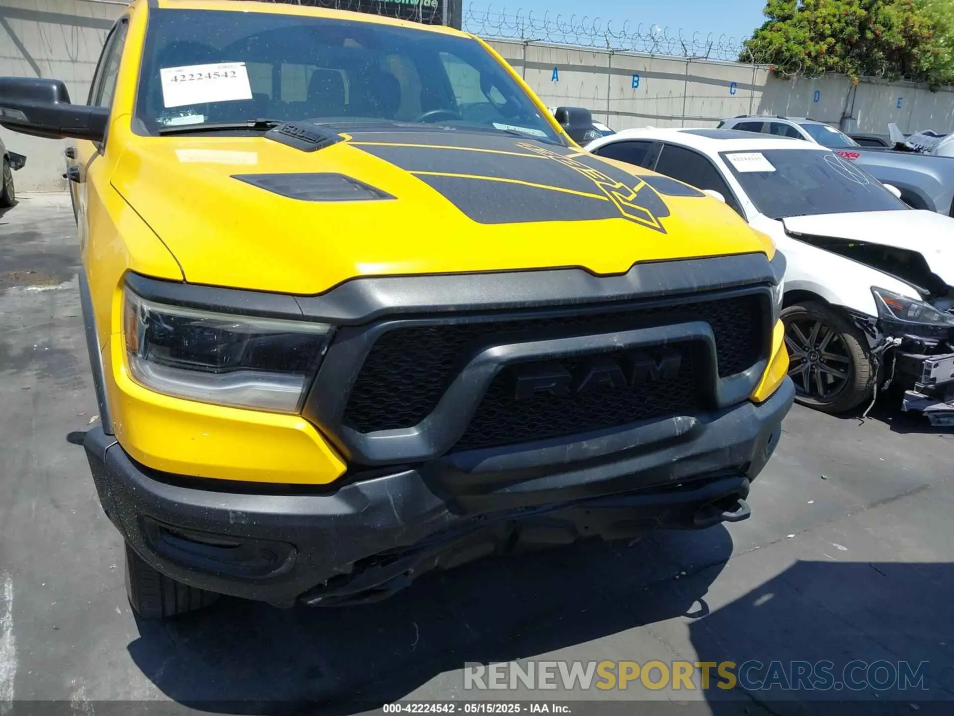 13 Photograph of a damaged car 1C6SRFLT3PN687390 RAM 1500 2023