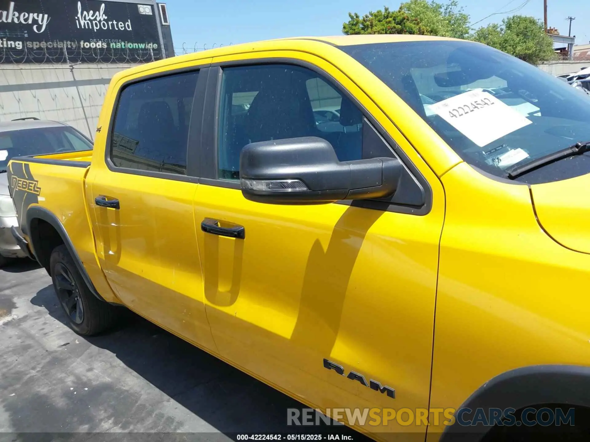 14 Photograph of a damaged car 1C6SRFLT3PN687390 RAM 1500 2023