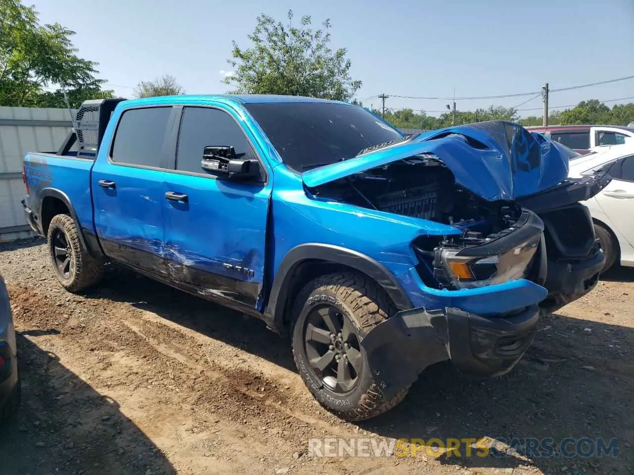 4 Photograph of a damaged car 1C6SRFLT5PN590742 RAM 1500 2023