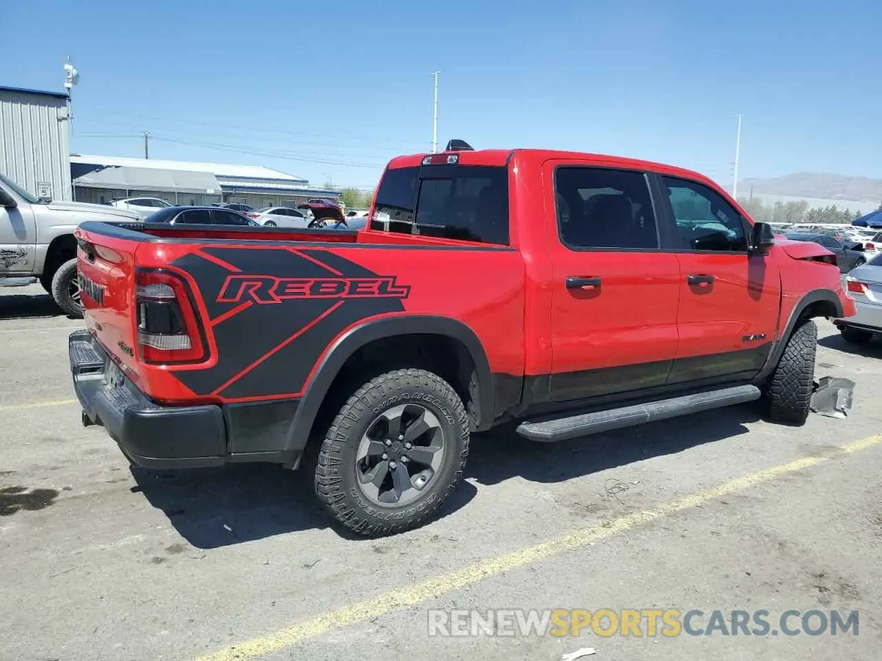 3 Photograph of a damaged car 1C6SRFLT6PN550685 RAM 1500 2023