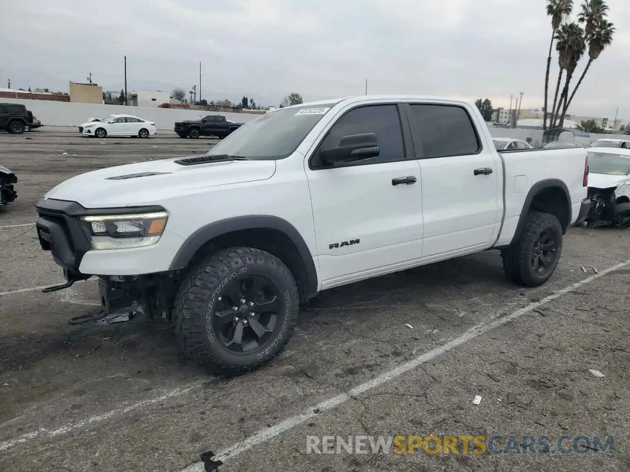 1 Photograph of a damaged car 1C6SRFLT6PN629323 RAM 1500 2023