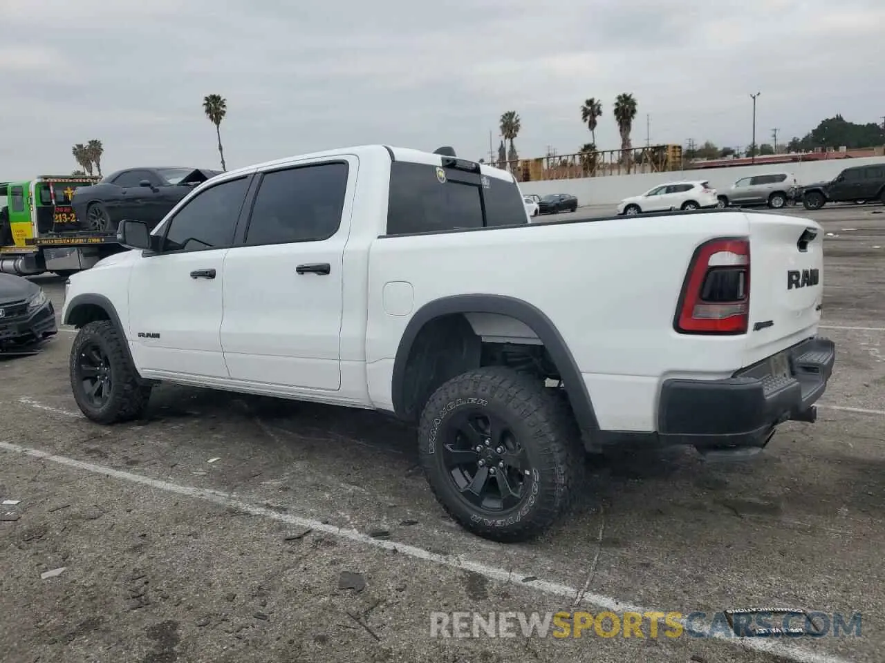 2 Photograph of a damaged car 1C6SRFLT6PN629323 RAM 1500 2023