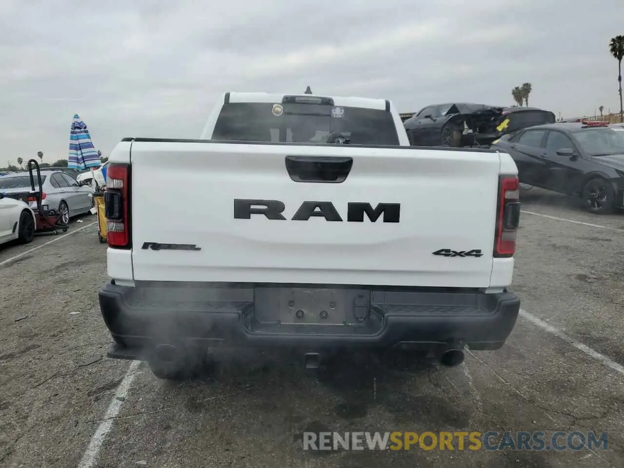 6 Photograph of a damaged car 1C6SRFLT6PN629323 RAM 1500 2023