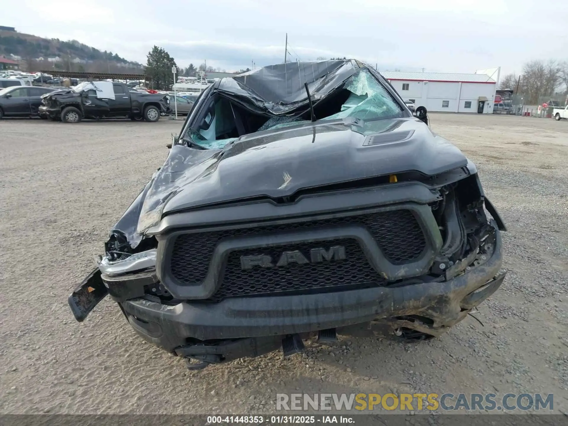 12 Photograph of a damaged car 1C6SRFLT6PN637289 RAM 1500 2023