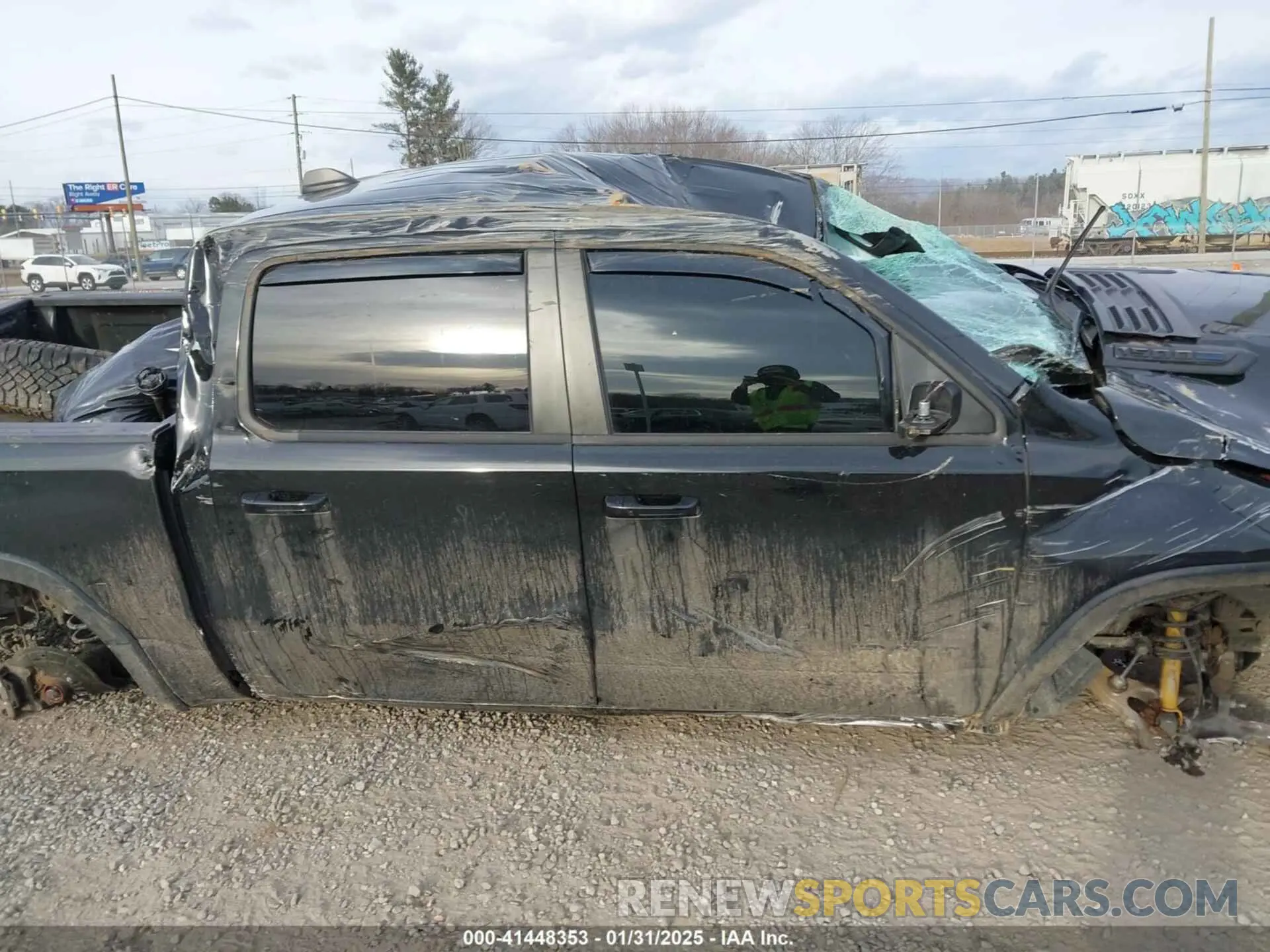 13 Photograph of a damaged car 1C6SRFLT6PN637289 RAM 1500 2023