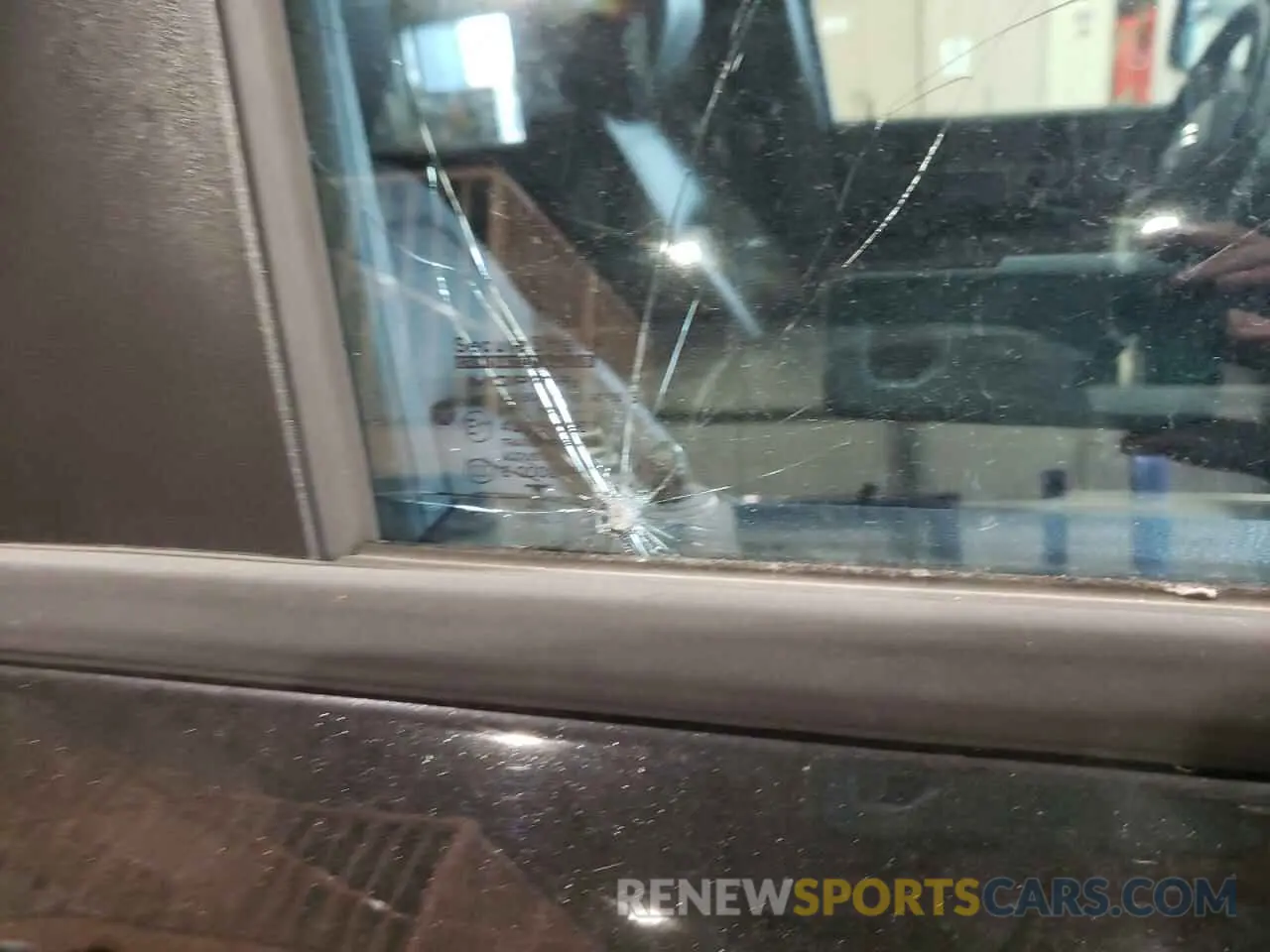 13 Photograph of a damaged car 1C6SRFLT6PN700696 RAM 1500 2023