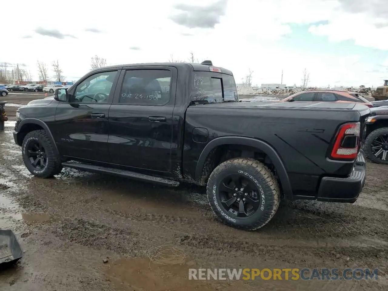 2 Photograph of a damaged car 1C6SRFLT6PN700696 RAM 1500 2023