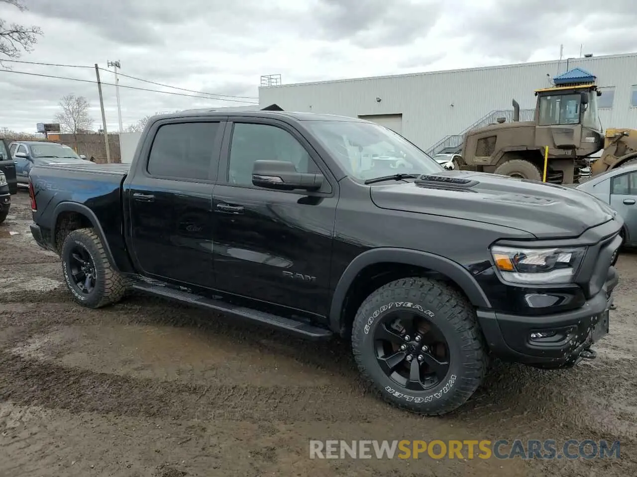 4 Photograph of a damaged car 1C6SRFLT6PN700696 RAM 1500 2023