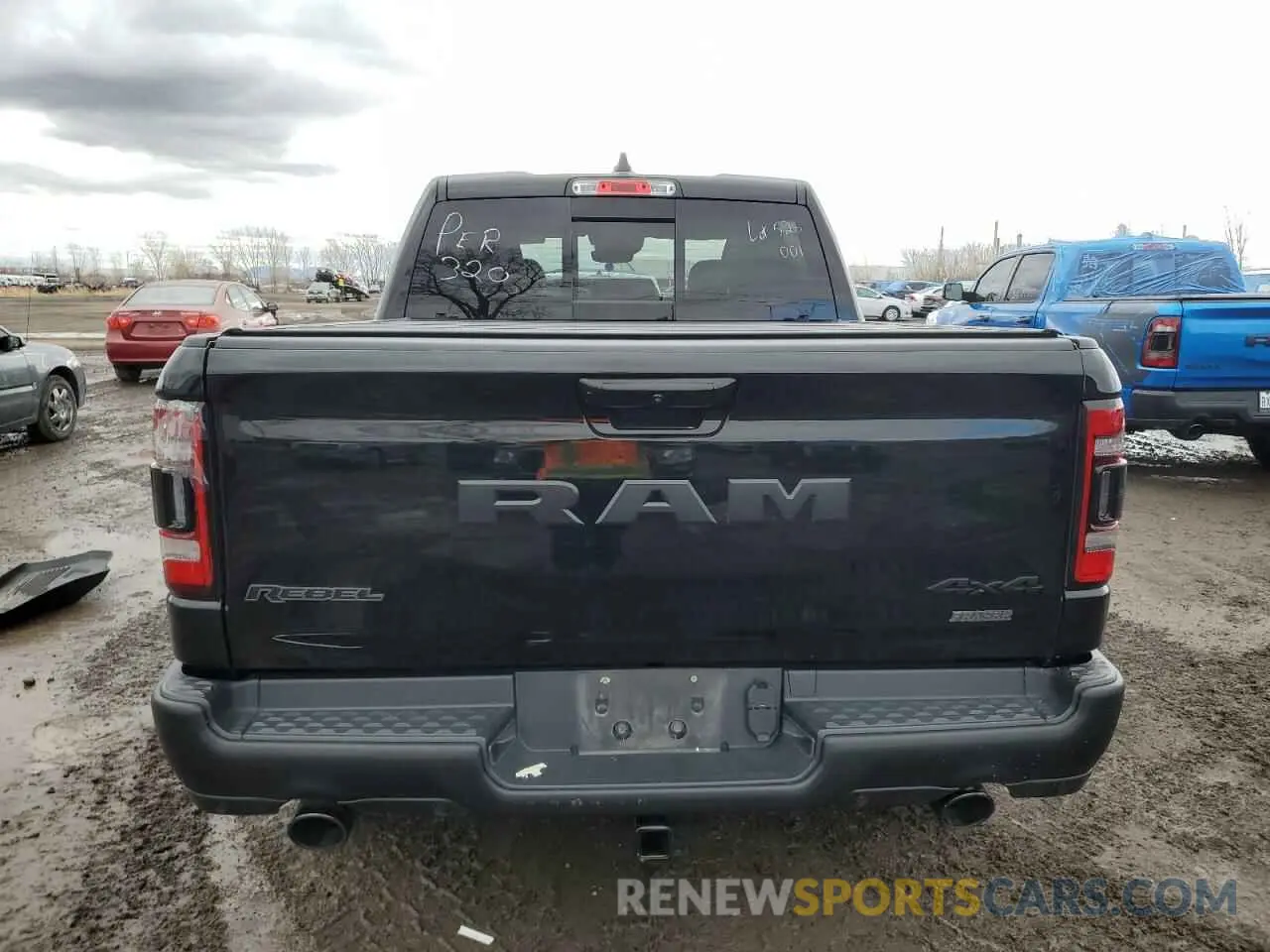 6 Photograph of a damaged car 1C6SRFLT6PN700696 RAM 1500 2023