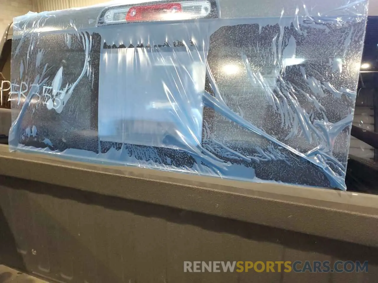 13 Photograph of a damaged car 1C6SRFLT7PN670947 RAM 1500 2023