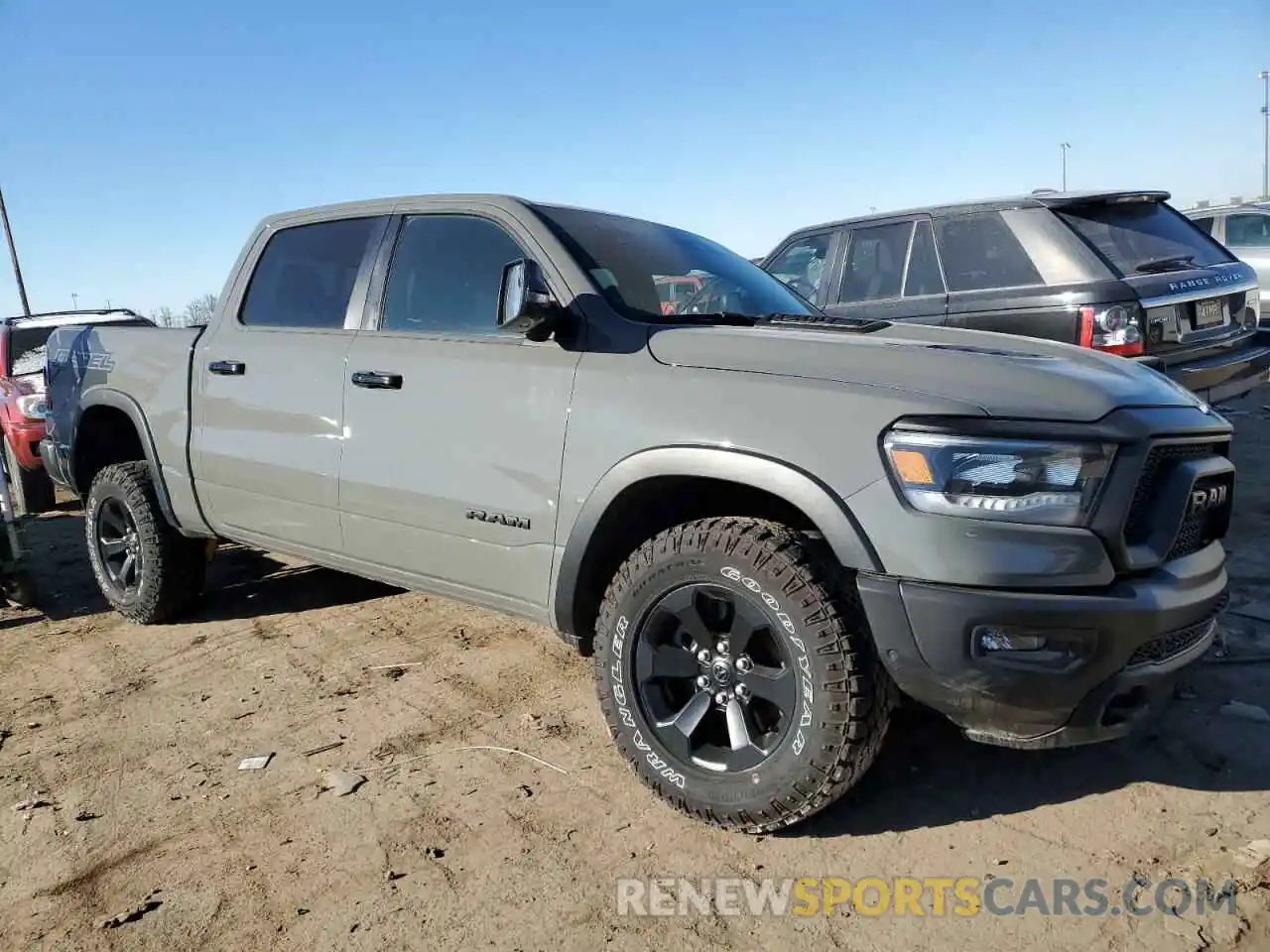 4 Photograph of a damaged car 1C6SRFLT7PN677588 RAM 1500 2023