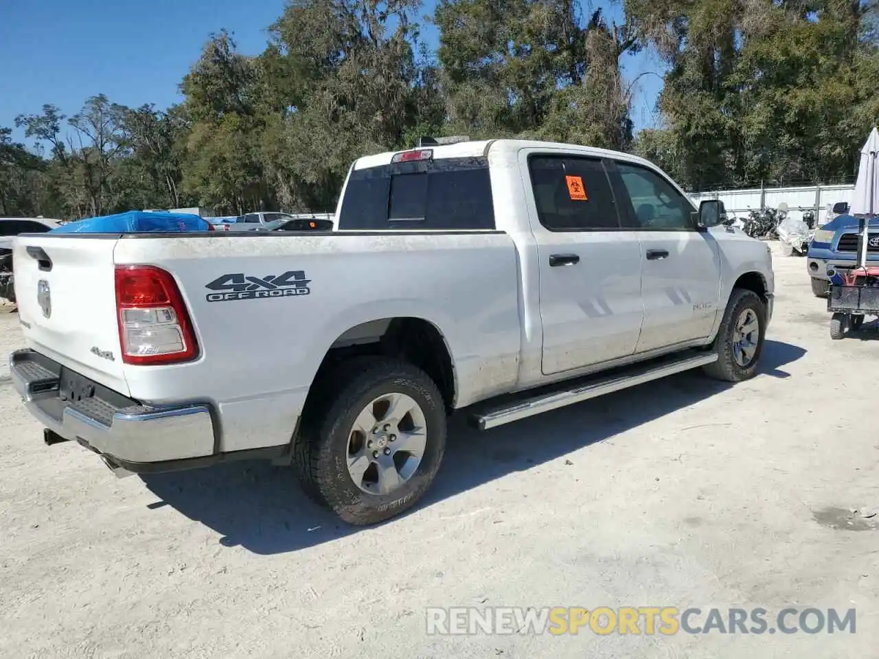 3 Photograph of a damaged car 1C6SRFMT0PN634743 RAM 1500 2023