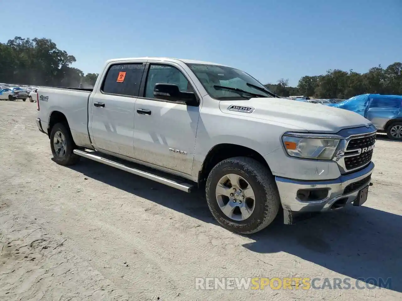 4 Photograph of a damaged car 1C6SRFMT0PN634743 RAM 1500 2023