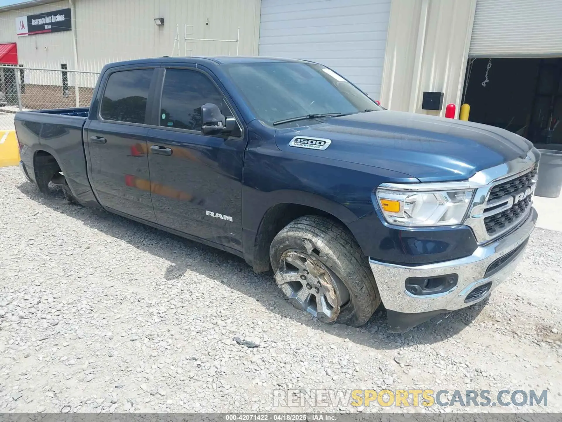 1 Photograph of a damaged car 1C6SRFMT1PN542489 RAM 1500 2023